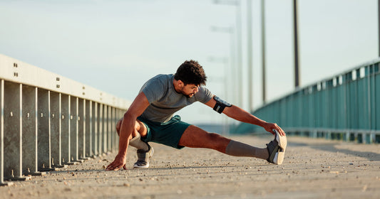 a man is stretching his leg