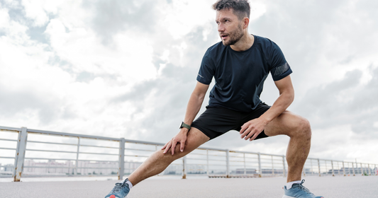 Runner doing side lunges.