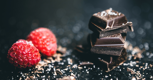 dark chocolate and two raspberries