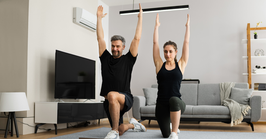 woman and man working out at home