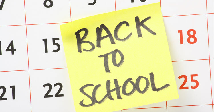 "back to school" sticker on a calendar