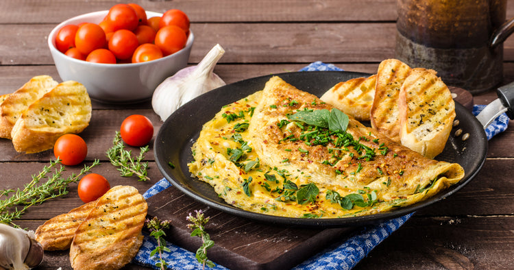 omelette with chives and oregano sprinkled with chili flakes