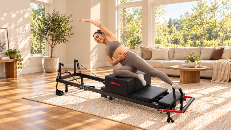 Athlete doing exercise on the pilates reformer. 