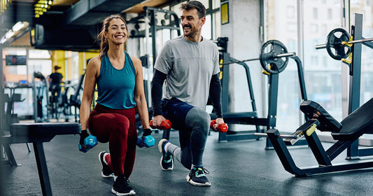 Woman and man strength training for cardiovascular health