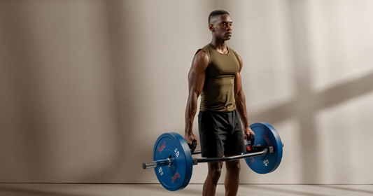 man works out with hex trap workout bar and weights