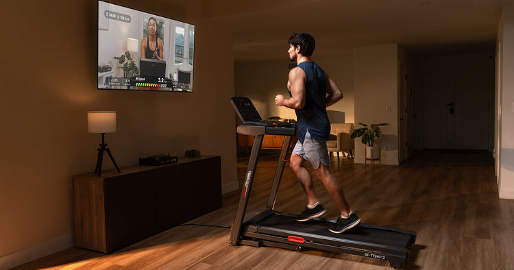 Man running on a Wi-Fi connected treadmill