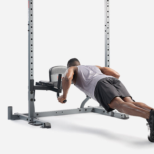 PUSH-UPS | Adjust the padded backrest to an incline and perform elevated push-ups for your upper chest.