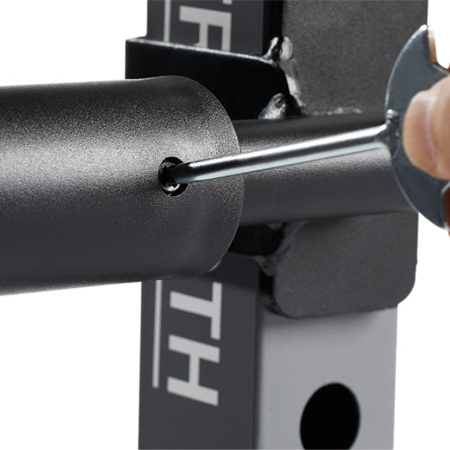 Safety Lock | Each sleeve features a safety lock mechanism that securely holds weight plates in place, ensuring a safe and stable workout experience.