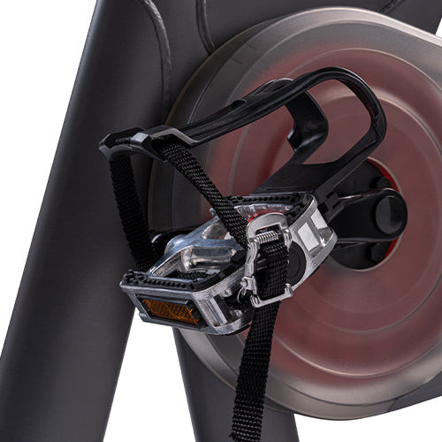 SPD-Ready Pedal Feel | SPD-compatible pedals plus toe cages and straps help keep your footing stable, especially during faster cadence work. 