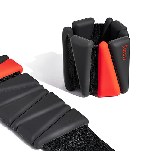 Secure Flexible Fit | Breathable elastic bands adjust for wrists or ankles, while the secure fastener helps keep them snug through every rep and step.
