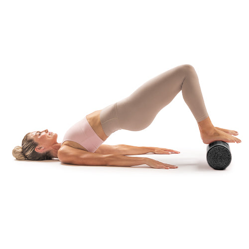 Bridge Pose | Raise hips from the floor while lying on your back to engage glutes and spine.