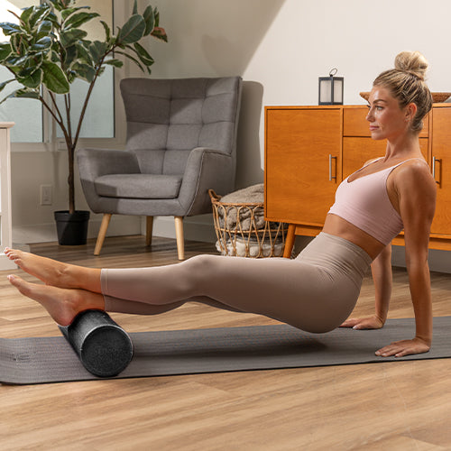 Calf Sweep | Glide the foam roller under your calf from ankle to knee to loosen muscles.