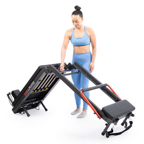 Foldable Reformer | Full-length Pilates platform folds for easier home storage.