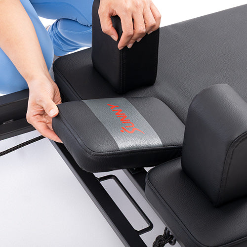 Adjustable Setup | Footbar, head pad, risers and rope adjust to fit.