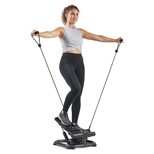 Full-Body Low-Impact Cardio | Combine stepping and resistance-band movement to engage your upper and lower body in one efficient workout.
