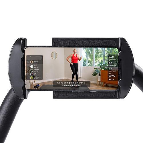 Device Holder | Keep guided workouts, progress tracking, or entertainment securely within view.
