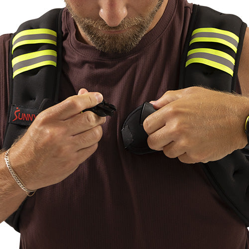 Secure Front Buckles | Adjustable front buckles, woven chest straps, and elastic back bands help keep the vest secure.
 