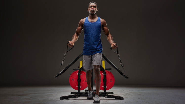 man exercising on homegym equipment