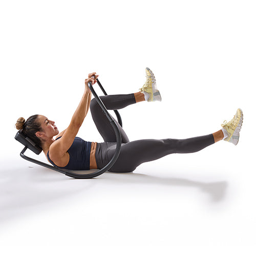 Full Body Crunches | Both upper and lower body lift simultaneously to engage the entire core.