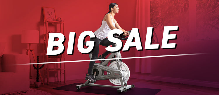 Fitness big sale banner with image of woman exercising on indoor cycle bike