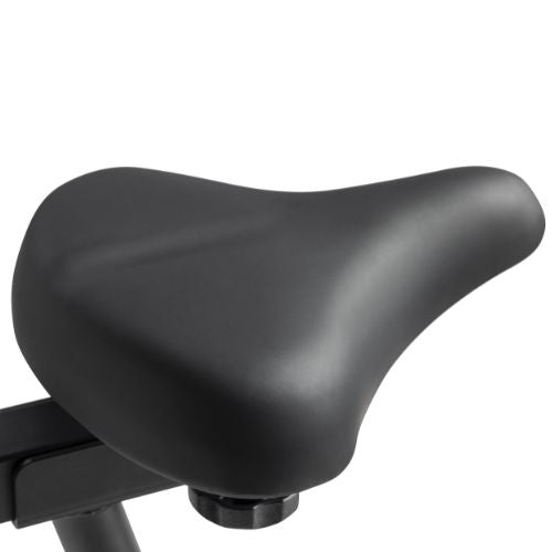 COMFORTABLE HOME CARDIO SETUP | A cushioned seat, easy-grip handlebars, anti-slip pedals, device holder, and app-connected training options help make every session more comfortable, convenient, and motivating from home.