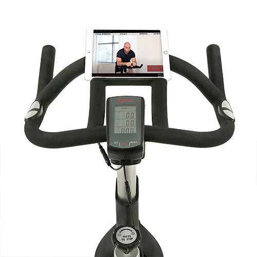 DEVICE HOLDER | Place your device above the digital monitor and start your workout routine by watching your favorite online training videos by Sunny Health & Fitness.