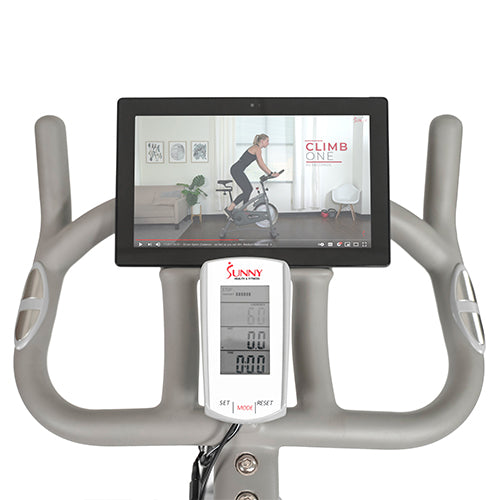 DEVICE HOLDER | Stay connected with your favorite fitness apps or follow along online to our Sunny Health & Fitness trainers using the large sturdy handlebar integrated device holder.