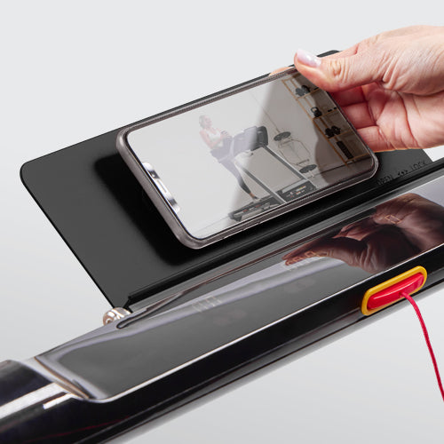 DEVICE HOLDER | Prop up your favorite devices on the treadmill by using the convenient tablet holder.