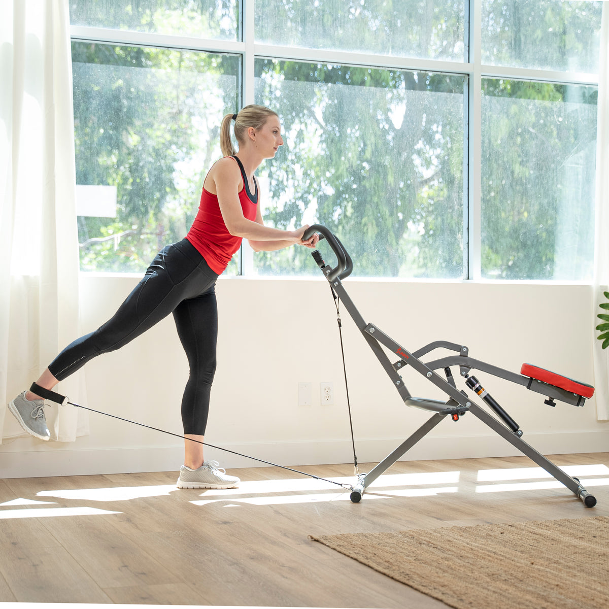  Sunny Health & Fitness Smart Upright Row-N-Ride™ Exerciser,  Squat Assist Trainer for Glutes Workout with Adjustable Resistance, Easy  Setup & Foldable, Glute & Leg Exercise Machine- NO. 077SMART : Sports